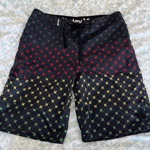 5/$18 Rasta Hurley swim trunks
